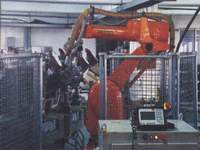Desma m/c, ABB/Unimation Robot for trimming, spraying